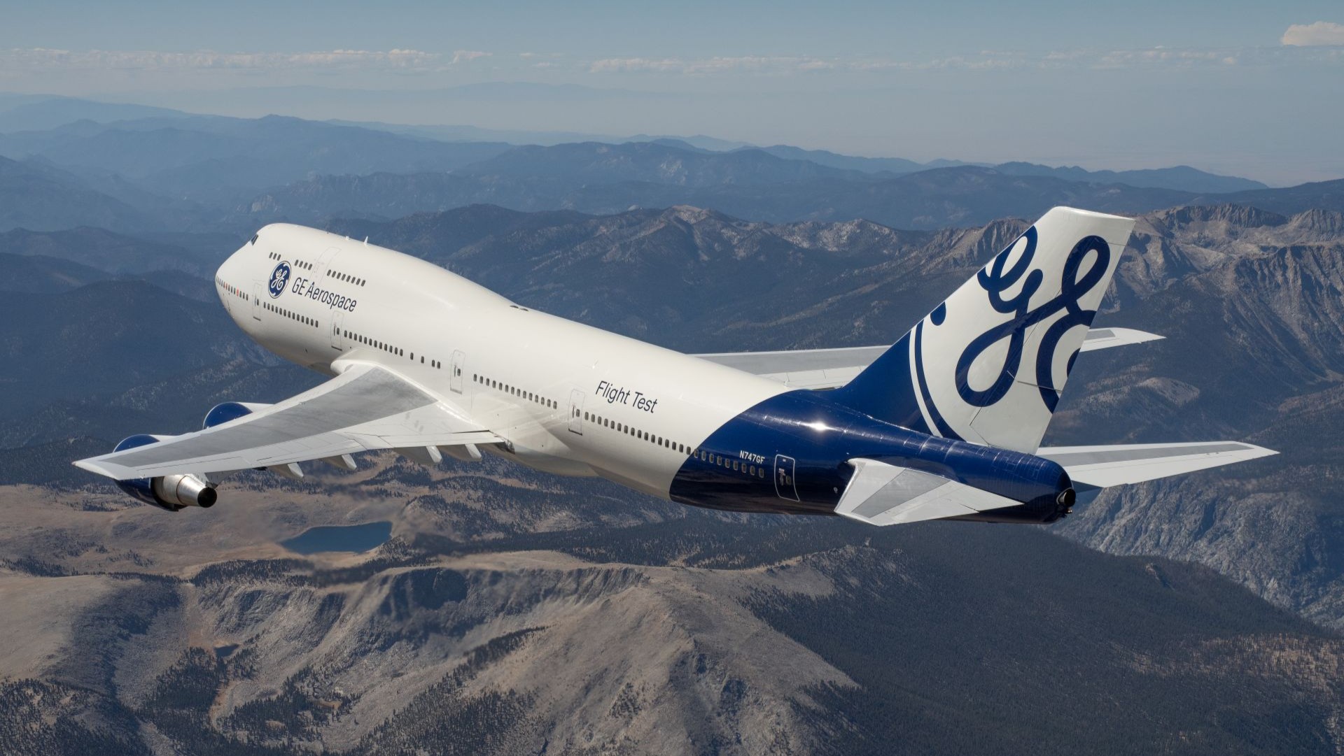 GE Aerospace 747-400 Flying Test Bed flying over mountains